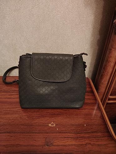 Çiyin çantası, Gucci