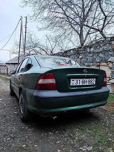 cruze ehtiyat təkər: Opel Vectra: 2 l | 1996 il 121331646 km Sedan — 6