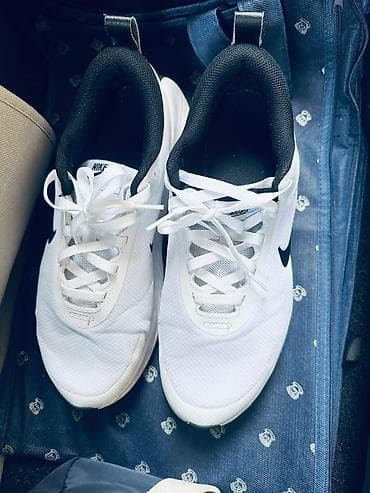 Nike kişi/kadın idman ayaqqabısı – ağ rəng, qara detallarla -