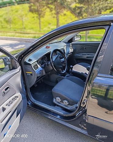 təkər satsi: Kia Rio: 1.4 l | 2006 il Sedan — 10