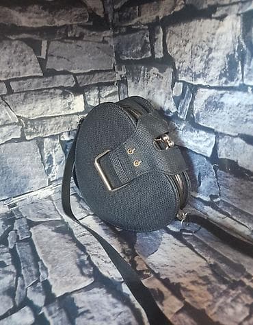 kişi ucun əl cantaları: Dairəvi formalı qadın çantası - Rəng: qara - Material: tekstura — 1