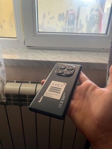 xiaomi modem 4a: Xiaomi 14 Pro, 256 ГБ, цвет - Черный, 
 Сенсорный, Отпечаток пальца, Беспроводная зарядка — 2