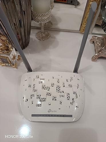 Modemlər və şəbəkə avadanlıqları: İki ədəd Wi‑Fi router 1) TP‑Link router - 2 ədəd xarici anten - Arxa — 3