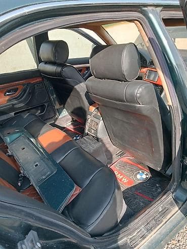 moto skuter: BMW 7 Series E38. Avtomobil göründüyü kimi mühərrik xanada balaca — 7
