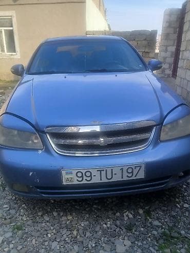 bmw e39 kapot: Chevrolet Lacetti sedan – mavi rəng. Xüsusiyyətlər: - Kuzov: 4 qapılı — 3