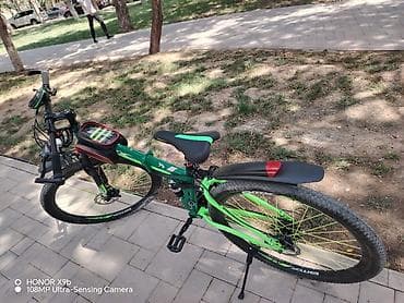 yeseved: Elektrik velosipedi – dağ/şosse hibrid tipli, yaşıl-qara rəng sxemi — 7