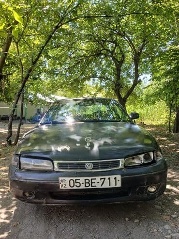 islenmis tekerler type 0 per page 40: Mazda 626 sedan Xüsusiyyətlər: - Güzgülərdə və kuzovda qara rəng - 4 — 2