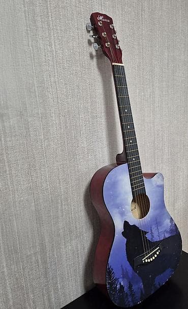 real gitara: Akustik gitara – “Ağlayan canavar” dizaynı - Korpus: kəsik (cutaway) — 2
