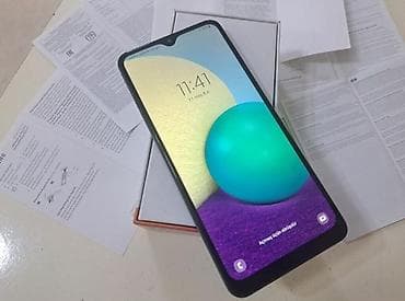 iphone 4 satilir: Samsung Galaxy A02, 32 GB, rəng - Göy, Zəmanət, Düyməli, Sensor — 7
