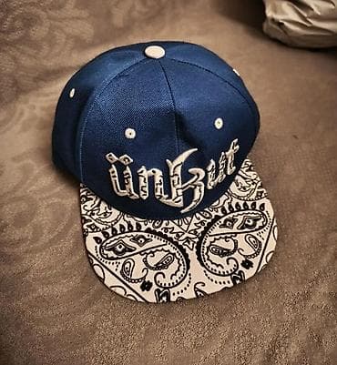 onlayn papaq: Unkut snapback papaq - Brend loqolu ön hissə: “ünKut” iri, relyefli — 2