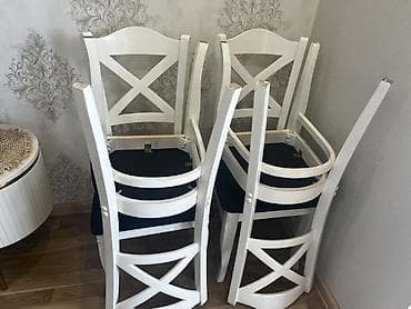 divan metbex: Ağ rəngdə yemək masası və 4 ədəd stul dəsti. Xüsusiyyətlər: - Stil — 2