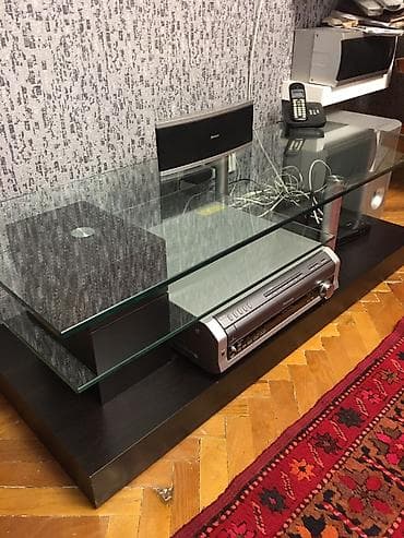 Стильная фирменная подставка под телевизор