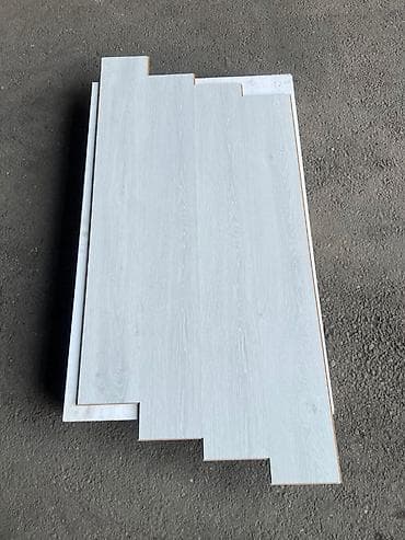 laminat ustasi: Açıq boz rəngli laminat döşəmə panelləri - Material: HDF əsaslı — 1