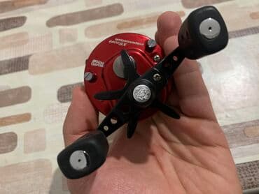 jmıx nədir: Abu Garcia Ambassadeur 6600SX multiplier reels red black. 5.3:1 gear — 7