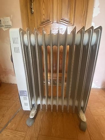 Yağlı radiator (elektrik isidici), 7 bölməli Xüsusiyyətlər: - Yağla — 1