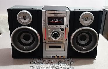 Musiqi mərkəzi "LG".Bluetooth,AUX,Disk,radio,kasset.Tam işlək