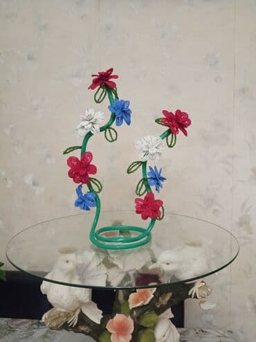 Muncuqdan düzəldilmiş gül formalı əl işi
Çox zövqlü bir işdir