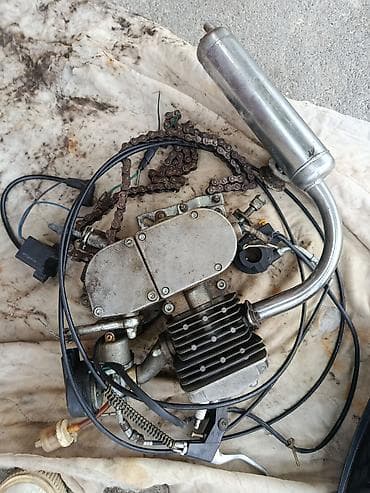 pec matoru: Velosiped üçün benzinli motor dəsti Tərkib: - 2-takt benzin mühərriki — 3
