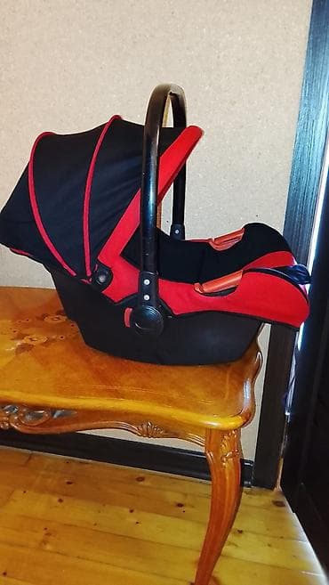 Avtokreslolar: Uşaq avtomobil oturacağı/daşıma beşiyi - Rəng: qara-qırmızı - Yeni — 1