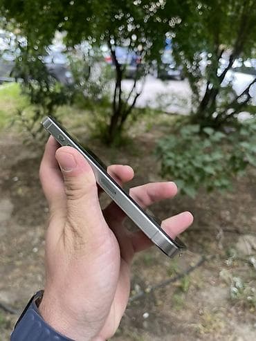 qulaqcıq iphone: IPhone 15 Pro, 128 GB, Gümüşü, Face ID — 2