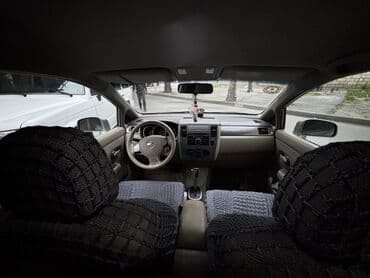 mersedes disk r15: Nissan Tiida: 1.6 l | 2006 il Sedan — 13