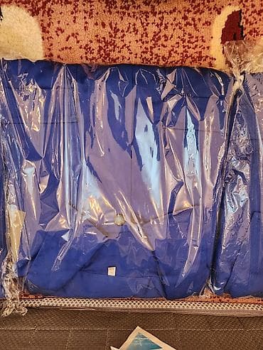 canta modelləri: Mavi rəngli kişi kostyumu – paketlənmiş halda. mavi kamizonlar 35 — 3