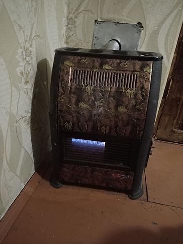 dekorativ kamin: Qaz sobası/konvektor tipli otaq qızdırıcısı - Yanacaq: təbii qaz - — 1