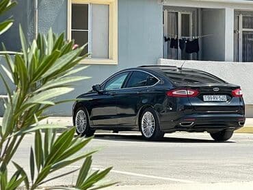 Maşın ideal Veziyyetdedir .Arxa Bufer Titanium BuferiArxa stoplar