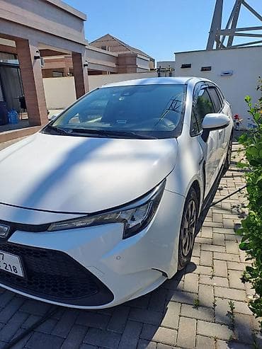 şüşə satışı: Toyota Corolla Touring Sports Hybrid – universal kuzovlu, ağ rəng — 7