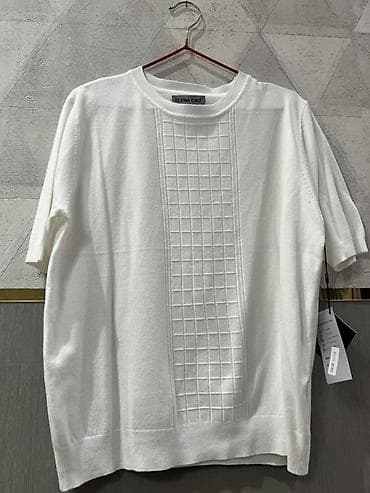 ag papaq: - Rəng: ağ - Model: qısaqol, dairəvi yaxa - Material: yumşaq trikotaj — 2