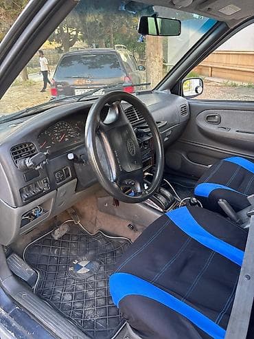 Kia Sportage: 2 l | 1999 il Ofrouder/SUV — 1