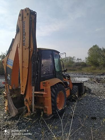 təkər r18: Komatsu WB97R ekskavator-yükləyici İşlək texnikadır. QIZDIRMA YOXDUR — 2