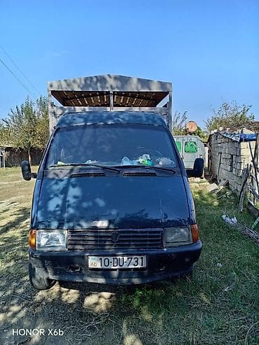 mtz 1025.2 satilir: Renault yük mikroavtobusu – üstü hündür, taxta bortlu qoşma kasalı — 4