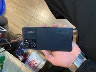 Apple iPhone: Poco X5 Pro 5G, 256 ГБ, цвет - Черный, Сенсорный — 1