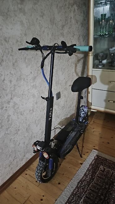 suktur: Elektrik skuter – Toba brendi Xüsusiyyətlər: - Güclü ön ikili faralar — 1