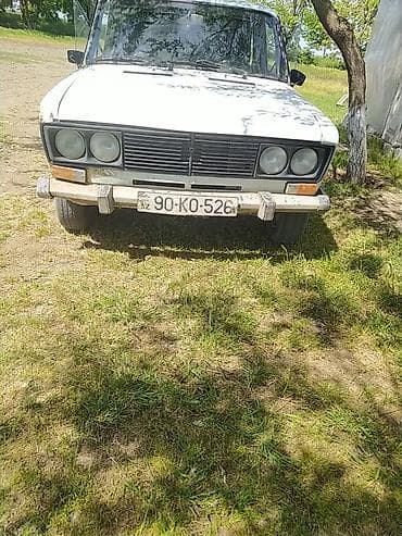 ucuz masnlar: VAZ 2106, ağ rəng, 4 qapılı sedan. Texniki və xarici xüsusiyyətlər: - — 1