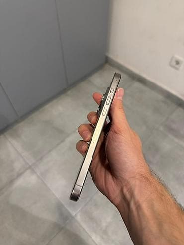 son model tv: IPhone 15 Pro Max, 1 TB, Gümüşü, Face ID — 6