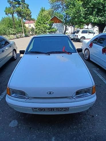 niva lada: LADA Samara (hatchback), ağ rəng. Xüsusiyyətlər: - Kuzov: 5 qapılı — 10