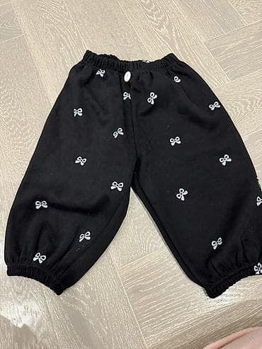 şalvar ölçüləri: Uşaq şalvarı - Rəng: qara - Naqiş: ağ rəngli balaca qurdela (kəpənək — 1