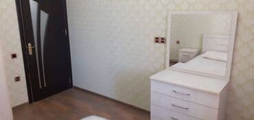 tam temirli menziller: İnşaatçılar metrosunun çıxısında inşaat binasında 12 mertebeli — 10