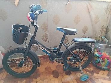 stels: Uşaq velosipedi – 16 düym təkərli, qara-mavi dizayn. Xüsusiyyətlər: - — 1