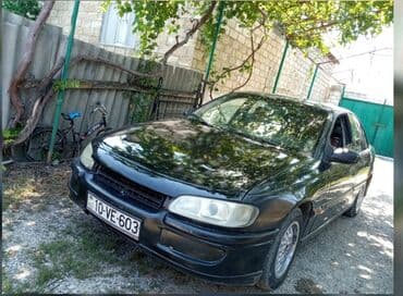 Motonəqliyyat: Opel Omega sedan – qara rəng Texniki və xarici xüsusiyyətlər: - — 2