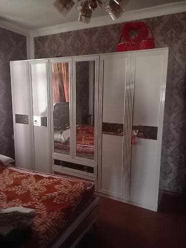 İkinəfərlik çarpayı