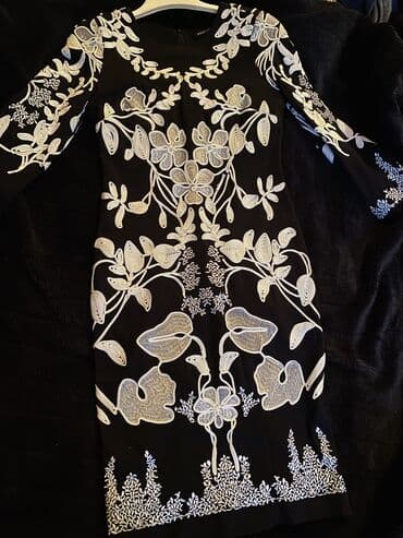 Don L razmer yazılıb içinə amma S/M olar məncə. 1,2 dəfə toya