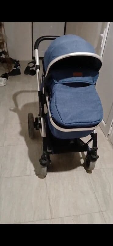 kalyaska ve usaq sumkasi per page 100: Uşaq arabası – mavi rəngdə, modern dizayn - Universal tip: körpələr — 1