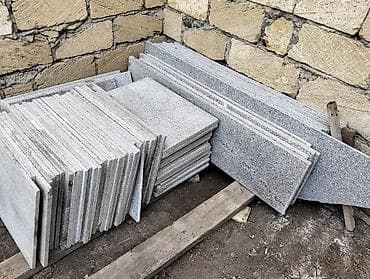 Qranit daş plitələr – boz rəng palitrası, cilalanmış/səthləri yonulmuş