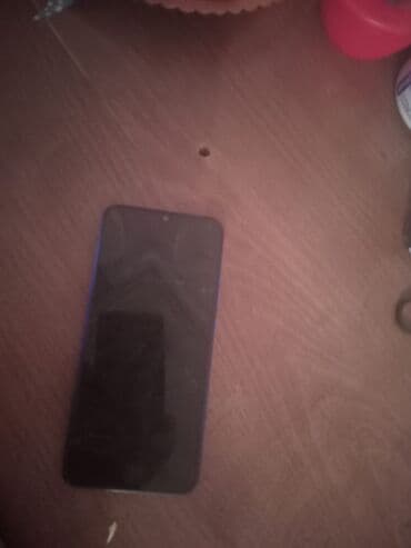 Xiaomi: Məhsul: Xiaomi Redmi 7A (mavi rəng) Xüsusiyyətlər: - 5.45" ekran, ön — 1