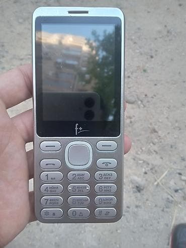 F+ düyməli mobil telefon Xüsusiyyətlər: - Korpus: gümüşü ön panel