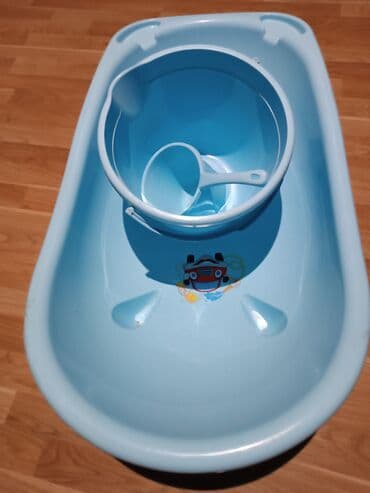 4 ayliq usaq sekilleri: Uşaq vanna komplekti – açıq mavi rəngdə. Komplektə daxildir: - Geniş — 1