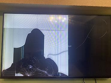 - Məhsul: Qırıq ekranlı LED televizor (divara asılan, nazik çərçivəli — 2